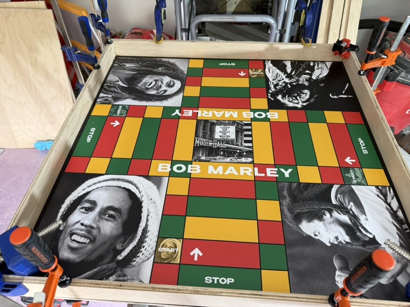 Tribute ludi board clamped in the workshop while the wood frame is glued