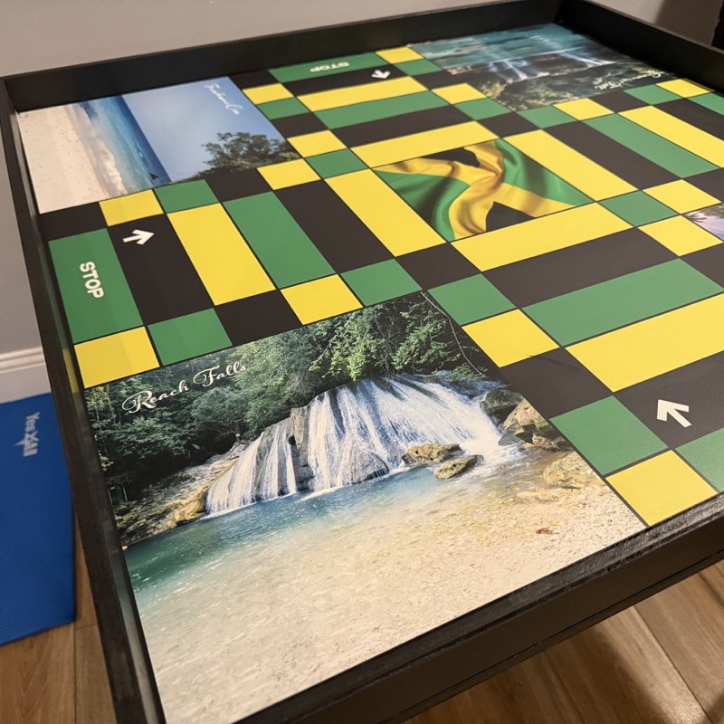 Reach Falls waterfall corner on a black green and gold ludi board
